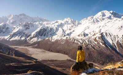 a-trekker-enjoying-landscape-of-langtang-valley-after-trekking